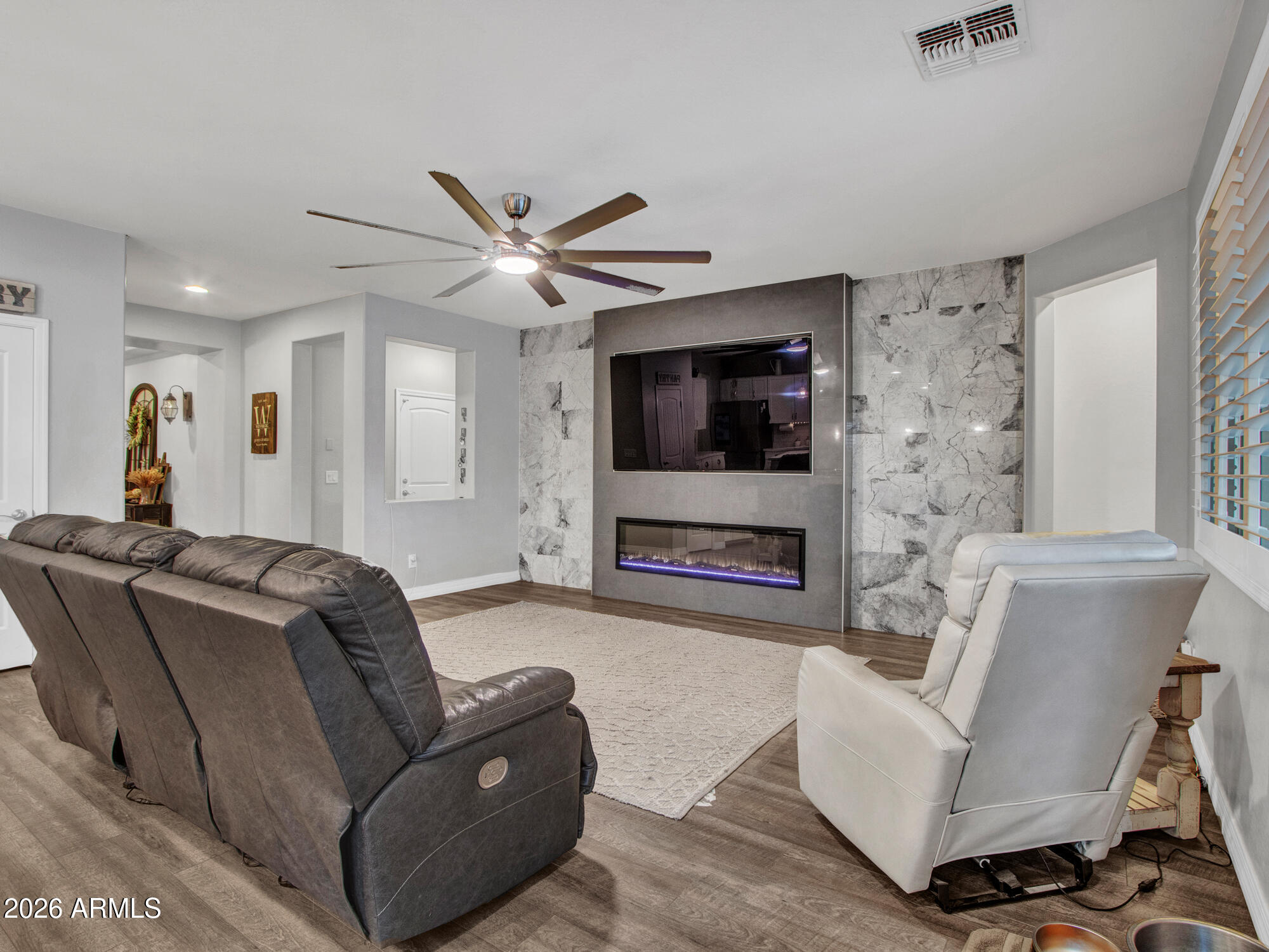 18216 West Montecito Avenue Goodyear, AZ 85395 - Photo 19 of 26 12-Living-room-(2)