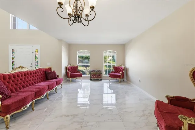 a view of a dining room with furniture window and outside view