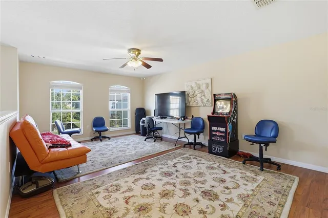 a bathroom with a toilet sink and shower