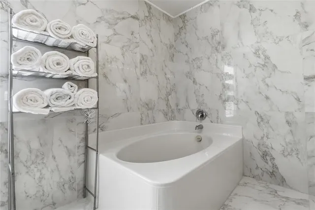 a view of swimming pool with an outdoor space and seating area