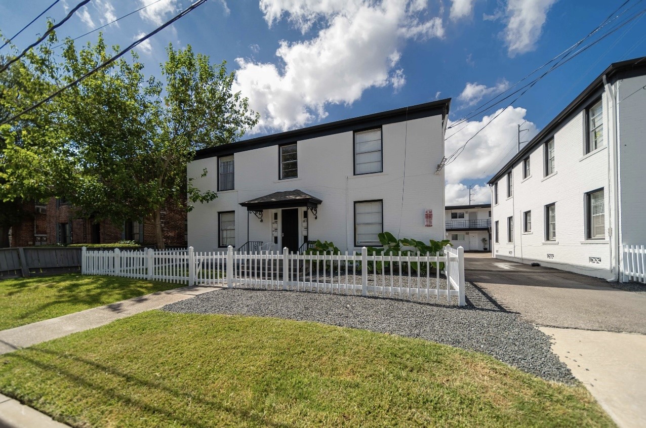 1851 West Main Street, Unit 3 Houston, TX 77098 - Photo 2 of 9 a view of a house with a backyard