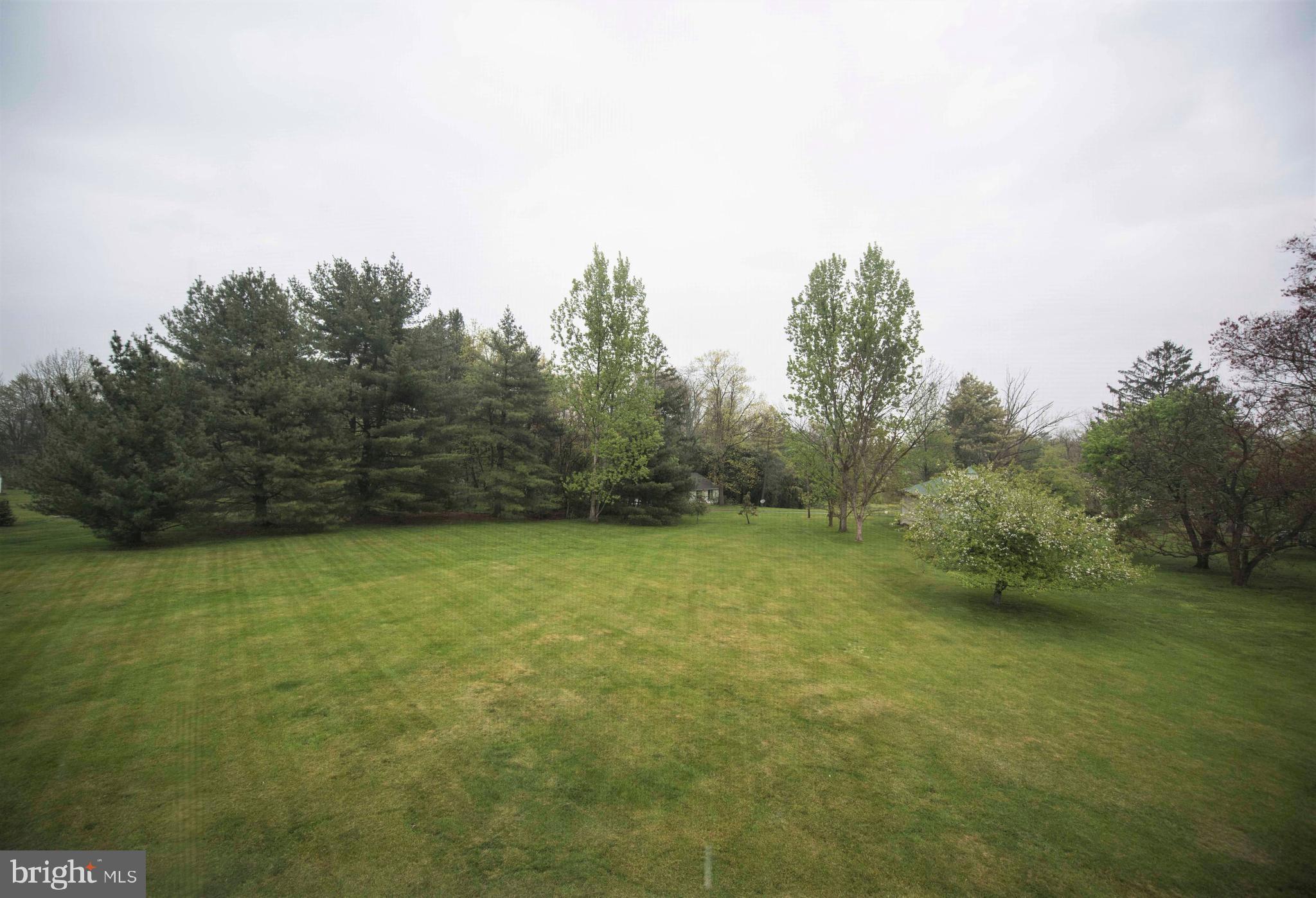 1003 Clymer Road Hatfield, PA 19440 - Photo 33 of 34 View of Rear Yard from House - Bordered by Trees