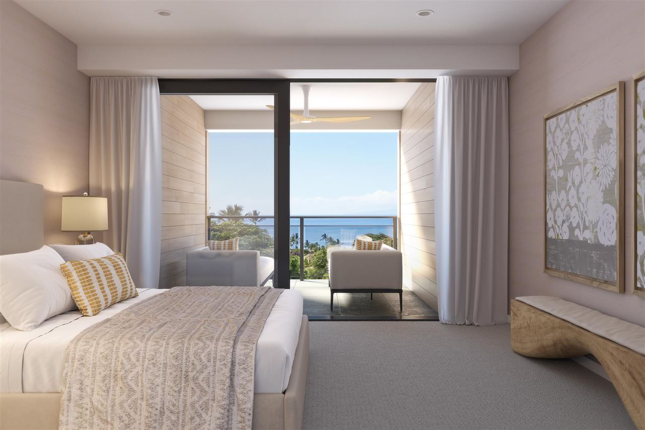 82 Kai Malu Drive, Unit 101 Kihei, HI 96753 - Photo 8 of 9 a bedroom with a bed and large window