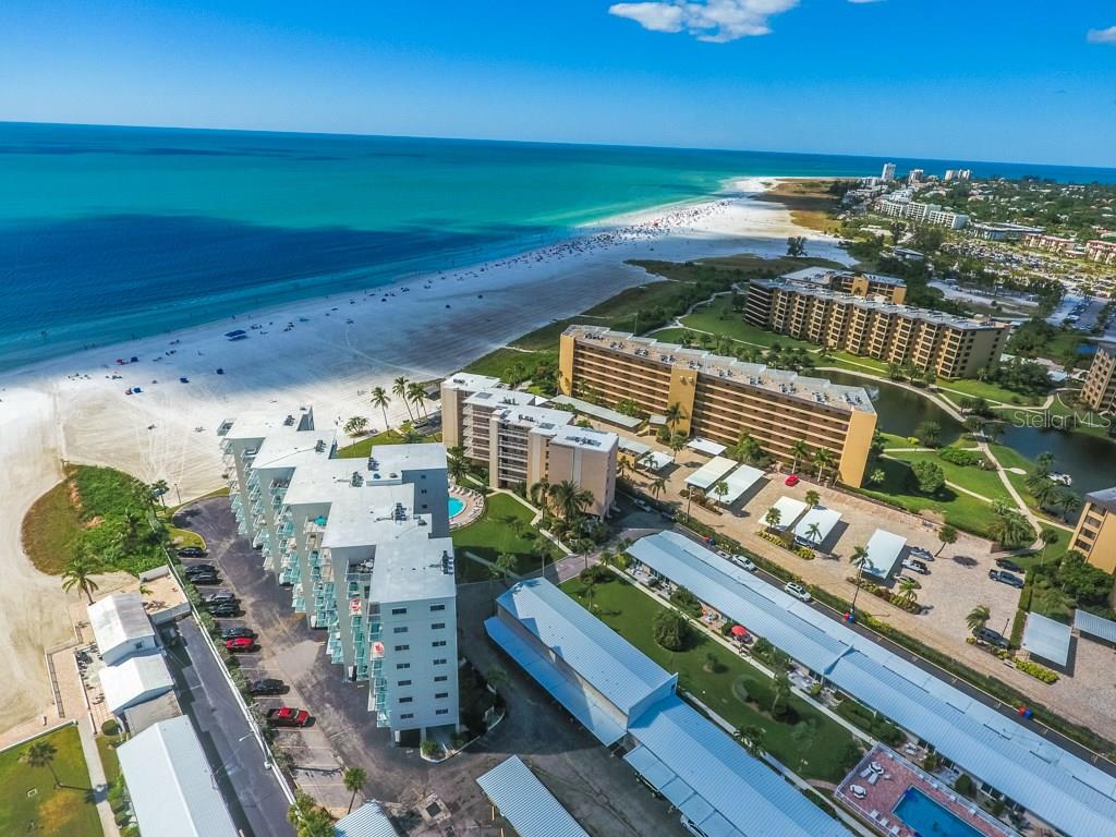 5830 Midnight Pass Road, Unit 99 Sarasota, FL 34242 - Photo 1 of 1 Miles of Siesta Key Beach just steps out your back door.