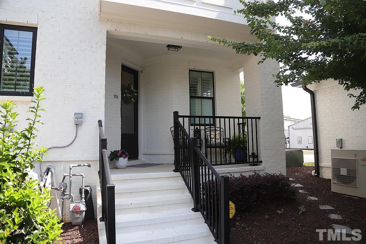1611 Draper View Loop, Unit 101 Raleigh, NC 27608 - Photo 1 of 13 a view of a balcony