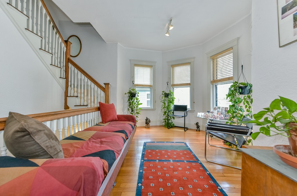 188 Rawson Road, Unit B Brookline, MA 02445 - Photo 2 of 21 a living room with furniture