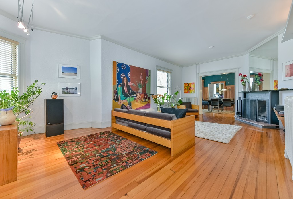 188 Rawson Road, Unit B Brookline, MA 02445 - Photo 5 of 21 a living room with furniture and a rug