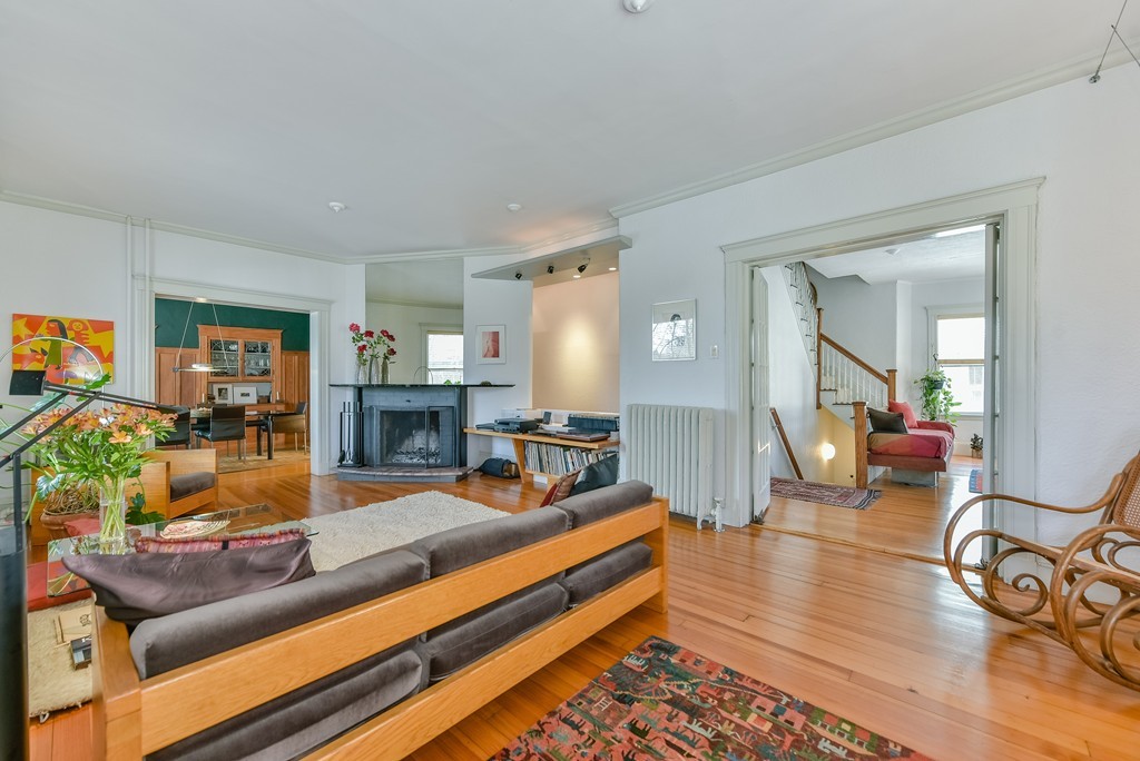 188 Rawson Road, Unit B Brookline, MA 02445 - Photo 6 of 21 a living room with furniture and wooden floor