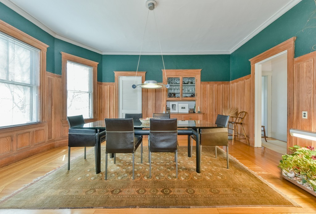 188 Rawson Road, Unit B Brookline, MA 02445 - Photo 8 of 21 a dining room with furniture and wooden floor