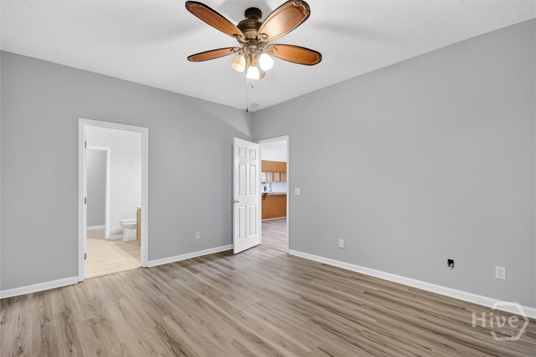 1 Putters Place Savannah, GA 31419 - Photo 18 of 39 Primary bedroom located on the rear of the home just off the living room
