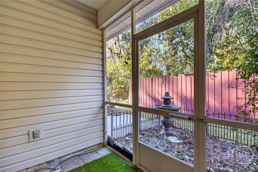 1 Putters Place Savannah, GA 31419 - Photo 35 of 39 Screened porch off of the primary bedroom