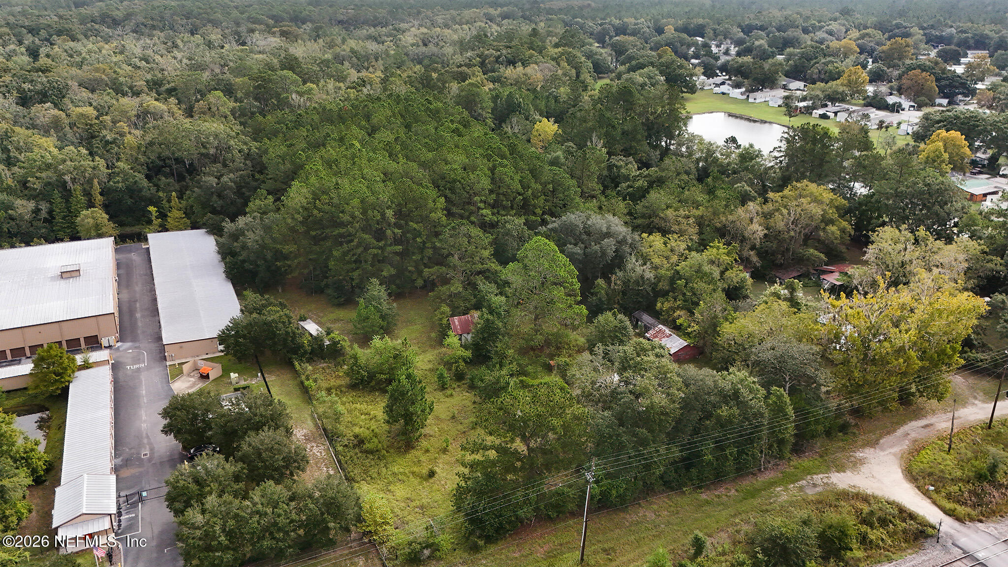 8803 Northwest 13th Street Gainesville, FL 32653 - Photo 6 of 17 an aerial view of residential houses with outdoor space and trees