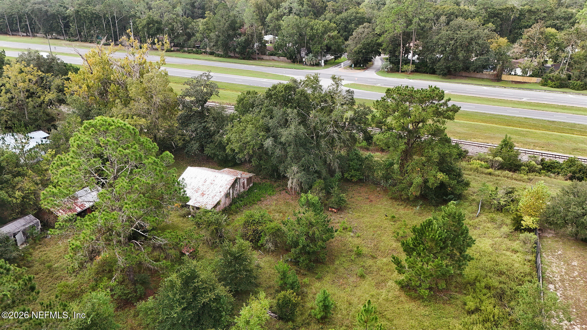 8803 Northwest 13th Street Gainesville, FL 32653 - Photo 10 of 17 a view of a swimming pool and an outdoor space