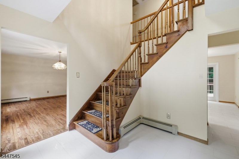 860 Glen Road Sparta, NJ 07871 - Photo 20 of 43 a view of entryway with wooden floor