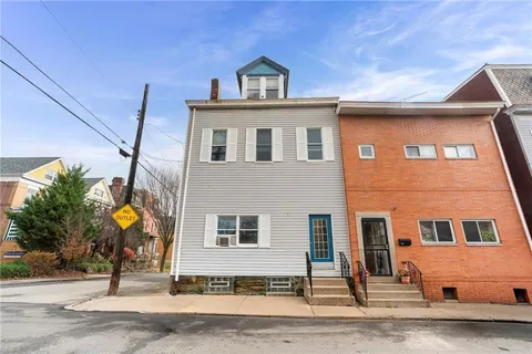 a front view of residential houses