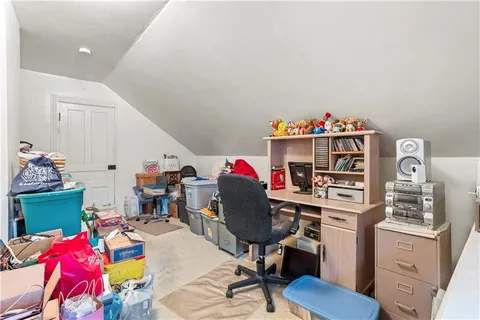 a kitchen with stainless steel appliances granite countertop a stove top oven a sink dishwasher and cabinets with wooden floor