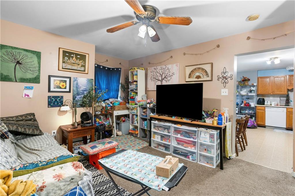 1524 Froman Street Pittsburgh, PA 15212 - Photo 26 of 48 a living room with furniture and a flat screen tv
