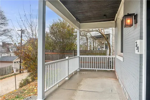 a view of a building with a street