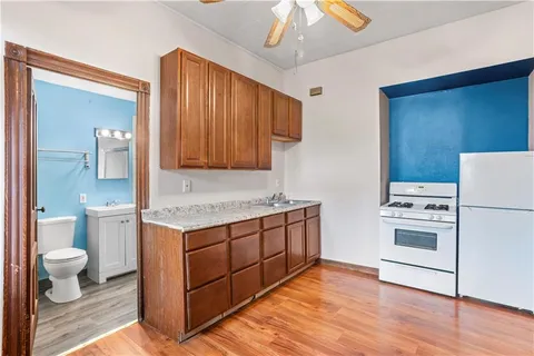 a view of bathroom with a washer and dryer