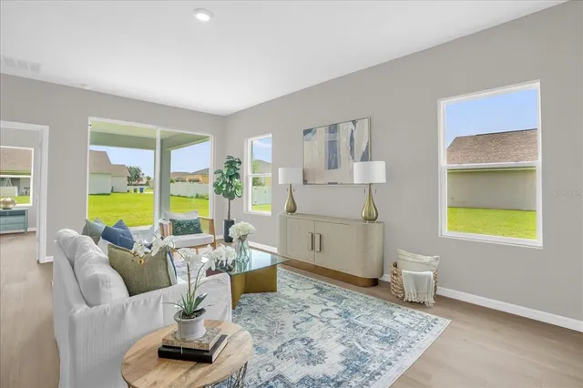 a living room with furniture and a table