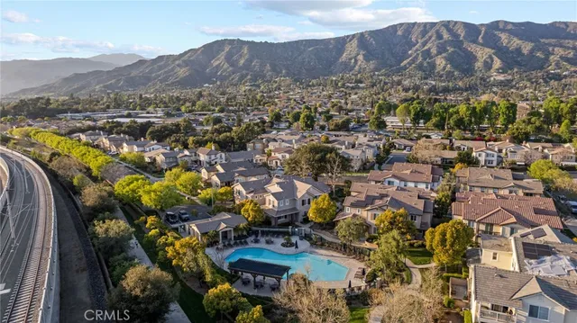 a view of a city with mountains in the background
