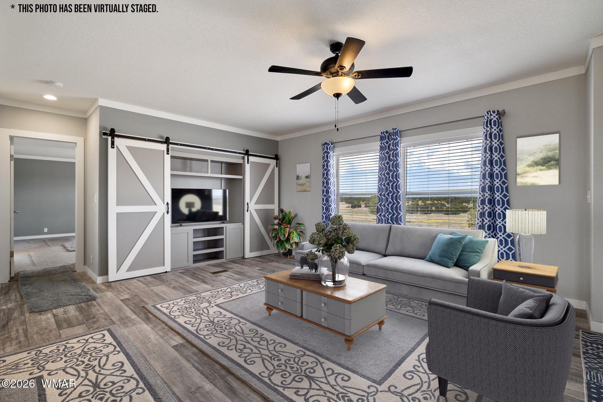159 County Road St. Johns, AZ 85936 - Photo 9 of 59 a living room with furniture and a large window