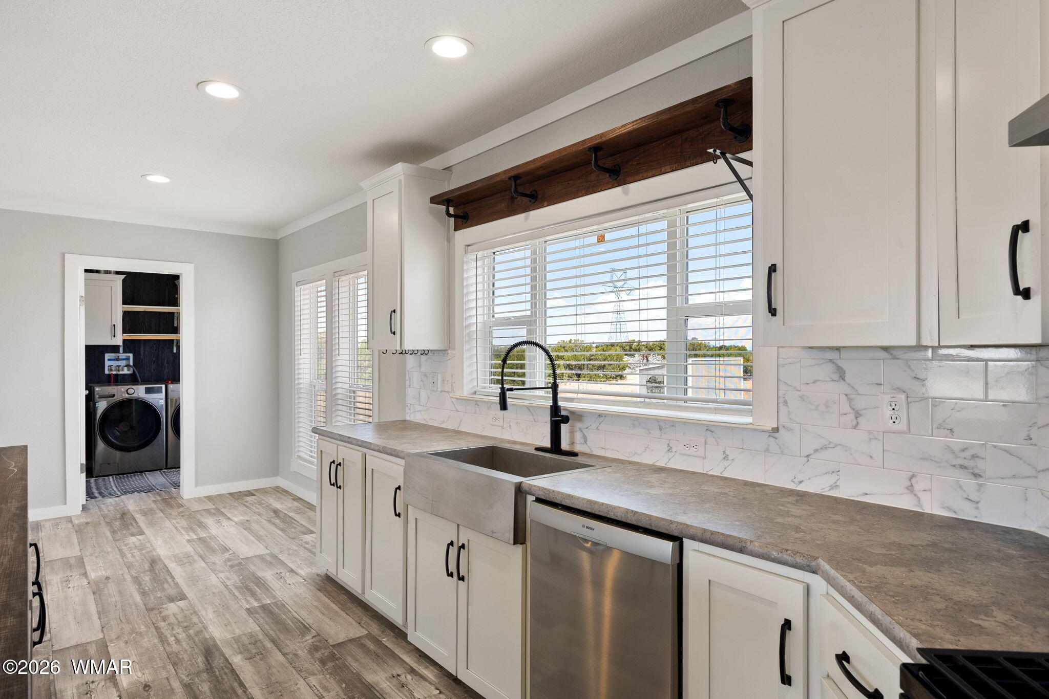 159 County Road St. Johns, AZ 85936 - Photo 13 of 59 a kitchen with a sink and cabinets