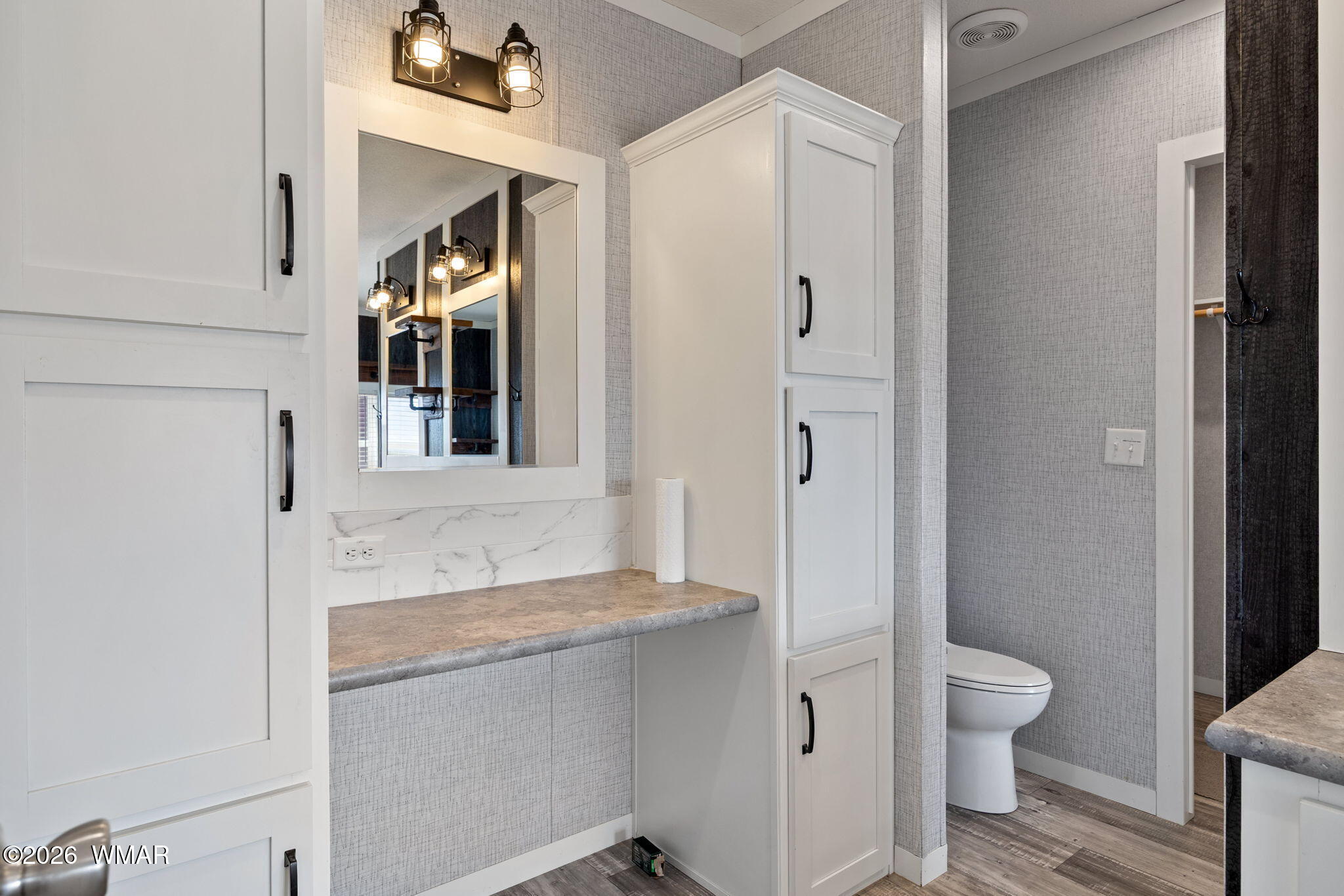 159 County Road St. Johns, AZ 85936 - Photo 21 of 59 a bathroom with a granite countertop sink and a mirror