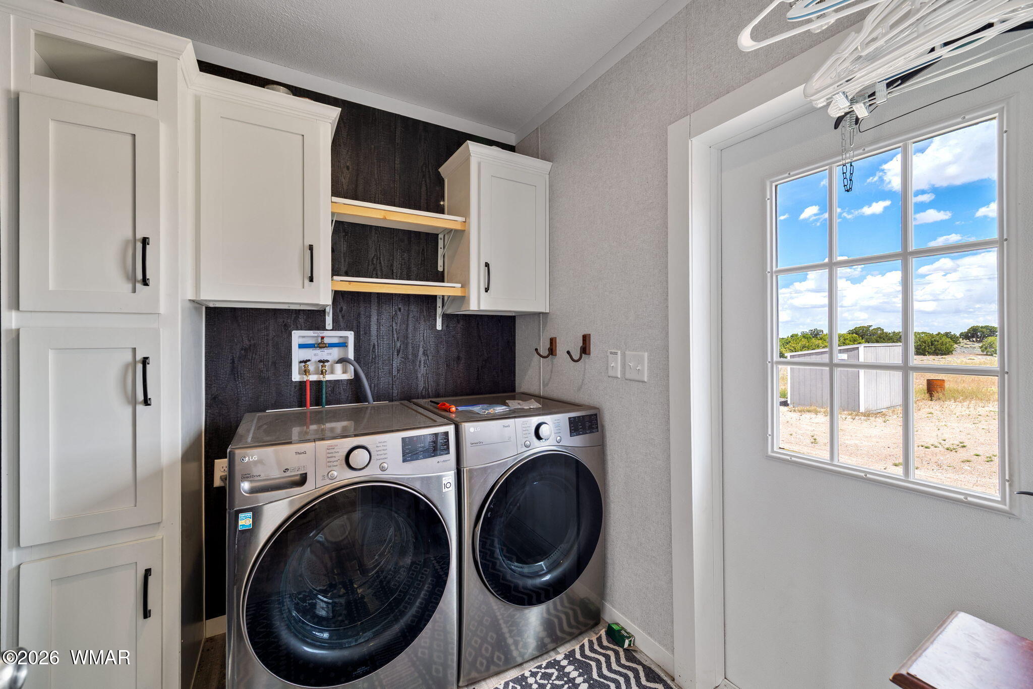 159 County Road St. Johns, AZ 85936 - Photo 36 of 59 a utility room with dryer and washer