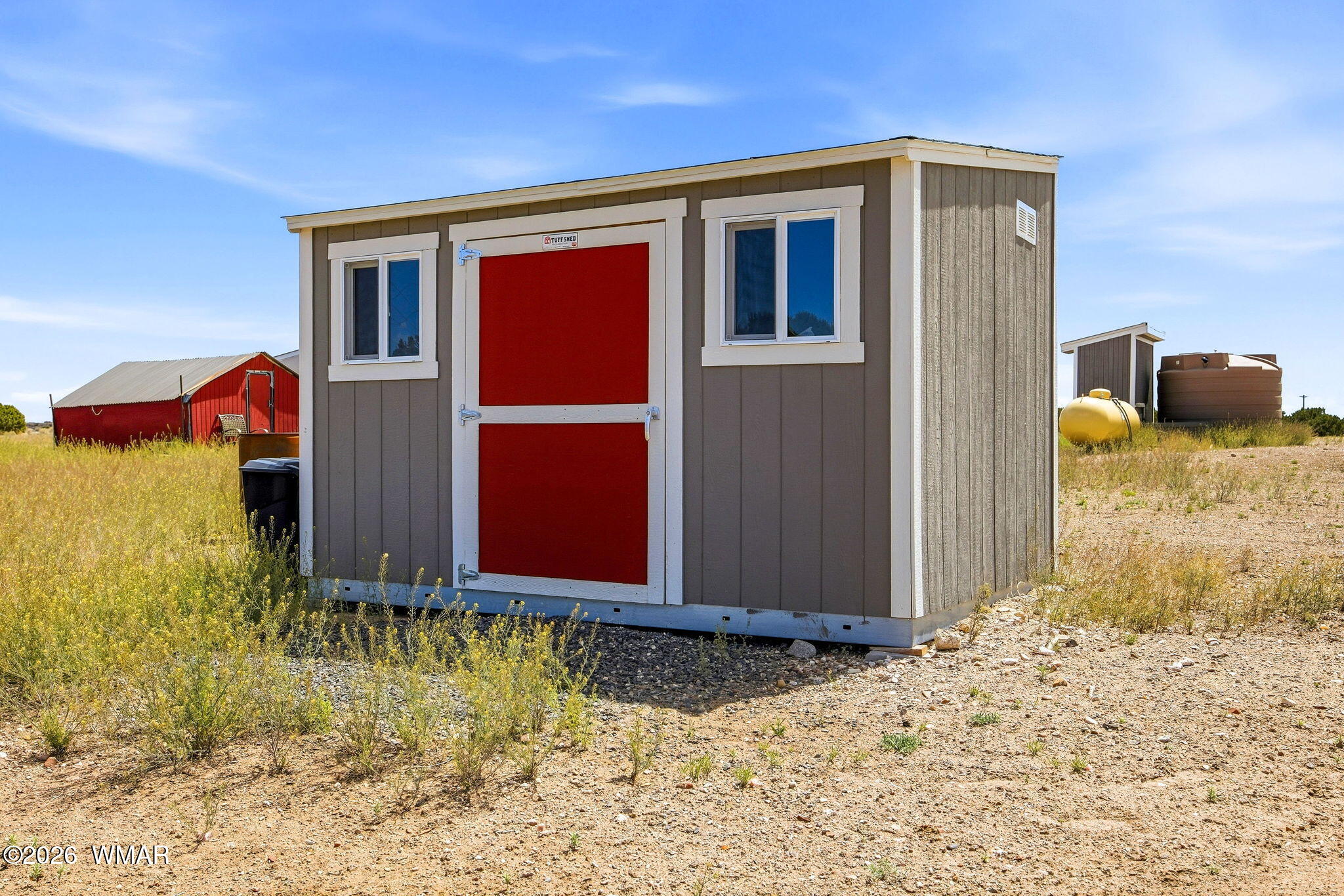159 County Road St. Johns, AZ 85936 - Photo 41 of 59 a view of a house with a yard