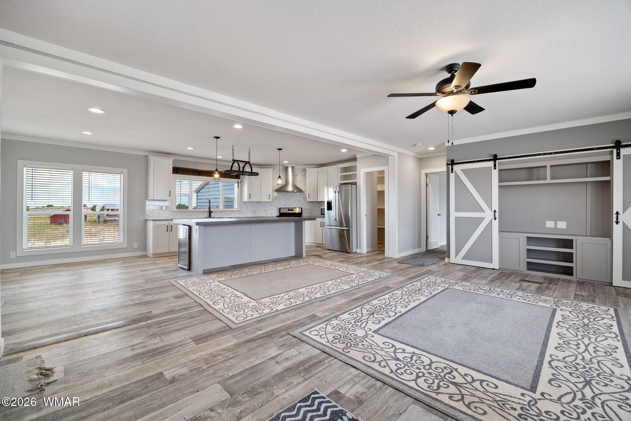 159 County Road St. Johns, AZ 85936 - Photo 7 of 59 a living room with stainless steel appliances furniture and a kitchen view