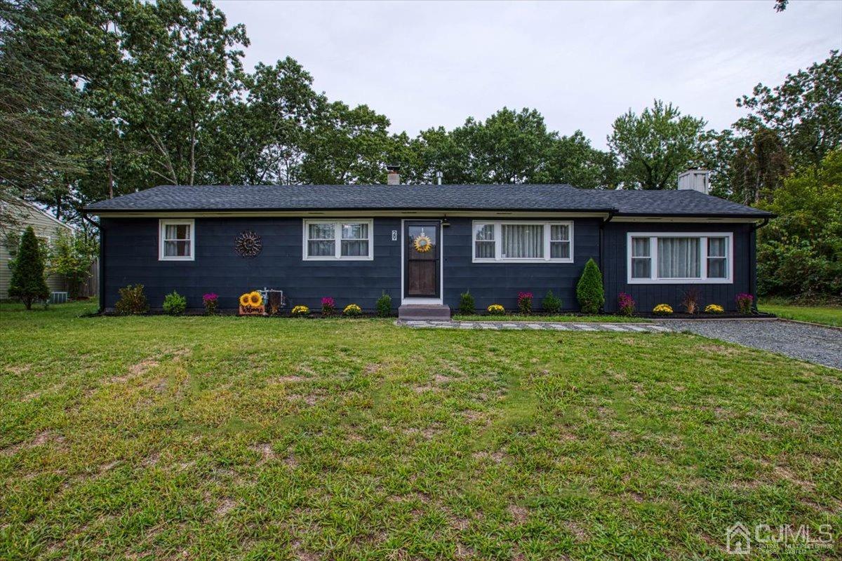 front view of a house with a yard