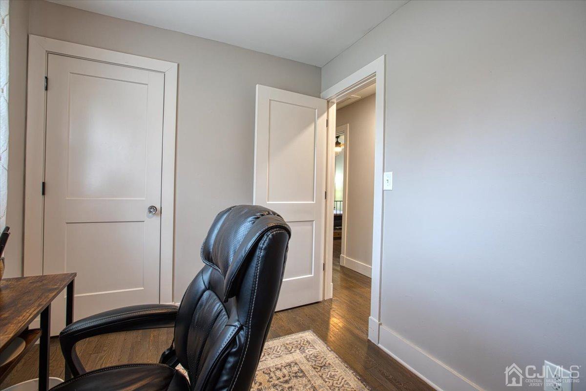 29 Clark Drive Howell, NJ 07731 - Photo 15 of 38 a view of a hallway with workspace