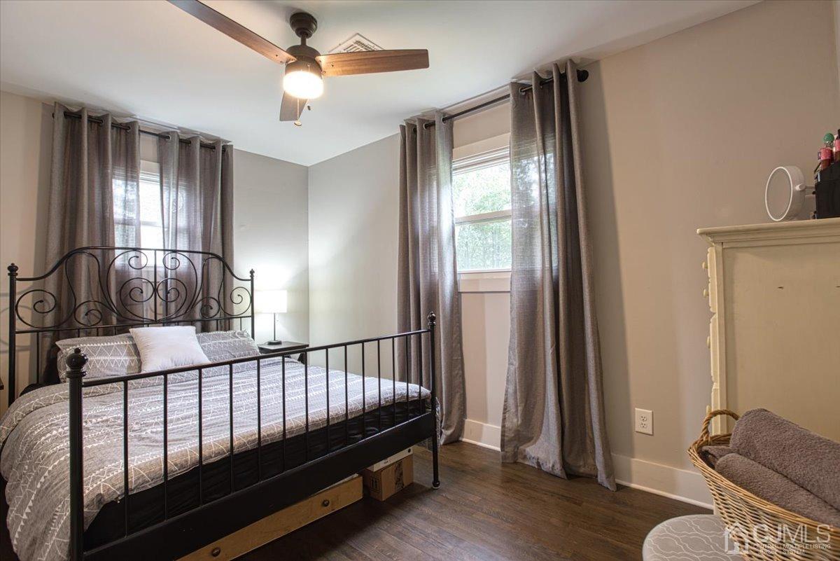 29 Clark Drive Howell, NJ 07731 - Photo 17 of 38 a bedroom with a bed and a window