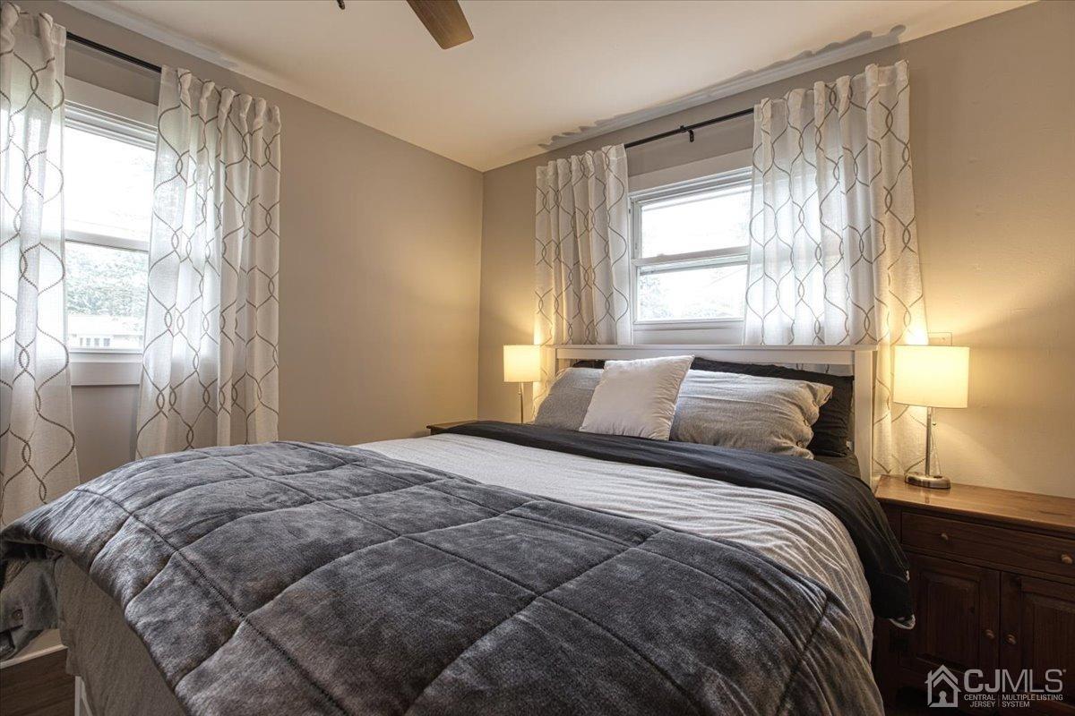 29 Clark Drive Howell, NJ 07731 - Photo 21 of 38 a bedroom with a bed and a window