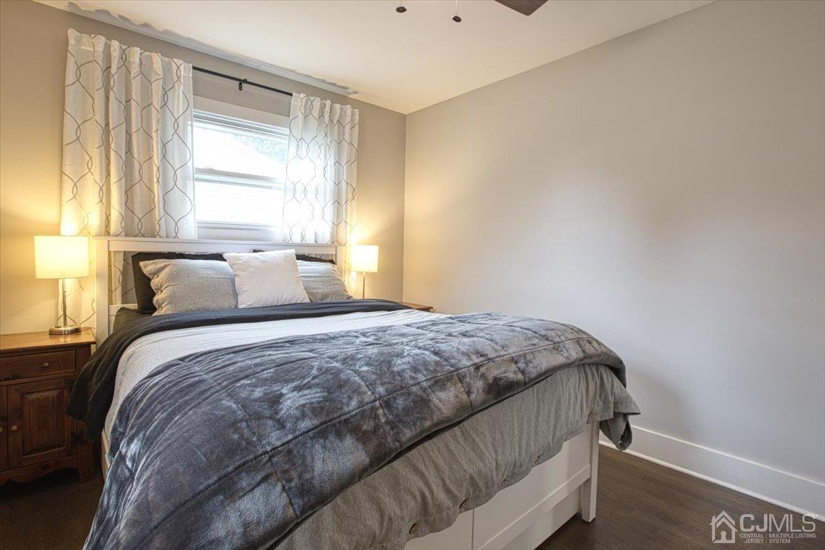29 Clark Drive Howell, NJ 07731 - Photo 22 of 38 a bedroom with a bed and window