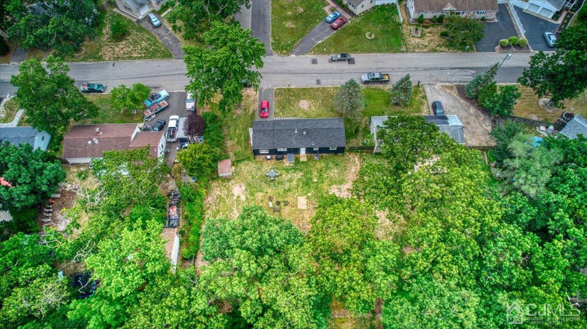29 Clark Drive Howell, NJ 07731 - Photo 34 of 38 an aerial view of a house with a yard