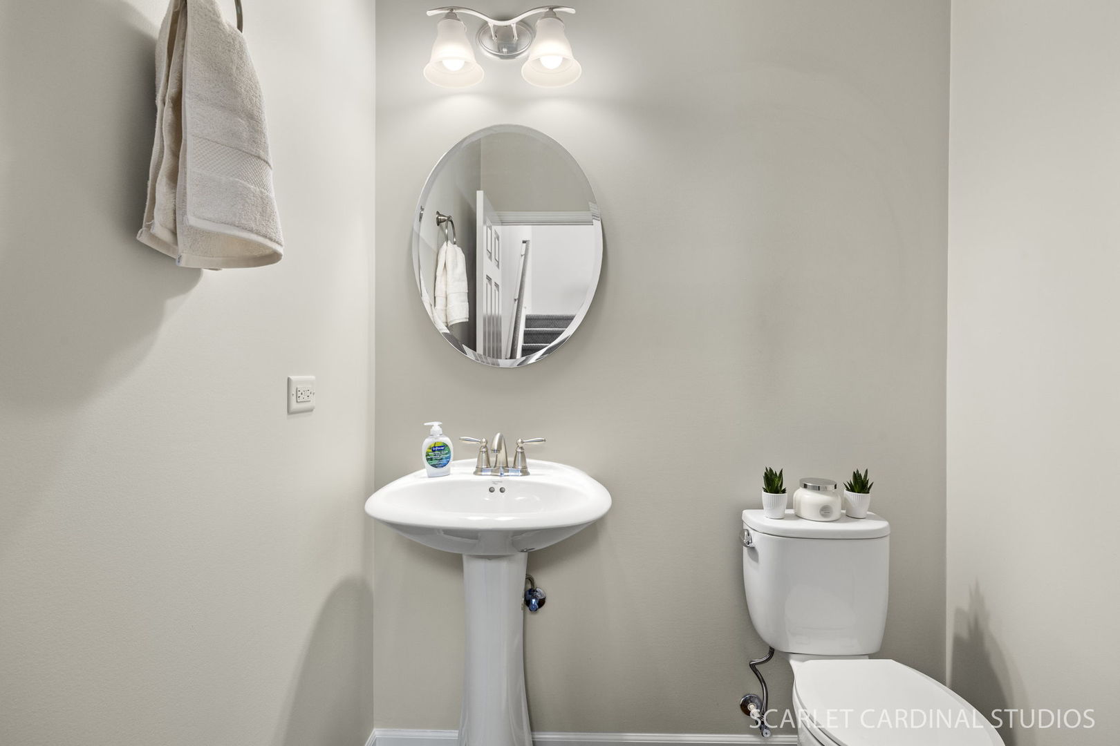 259 Bennett Drive Carol Stream, IL 60188 - Photo 16 of 31 a bathroom with a toilet a sink and mirror