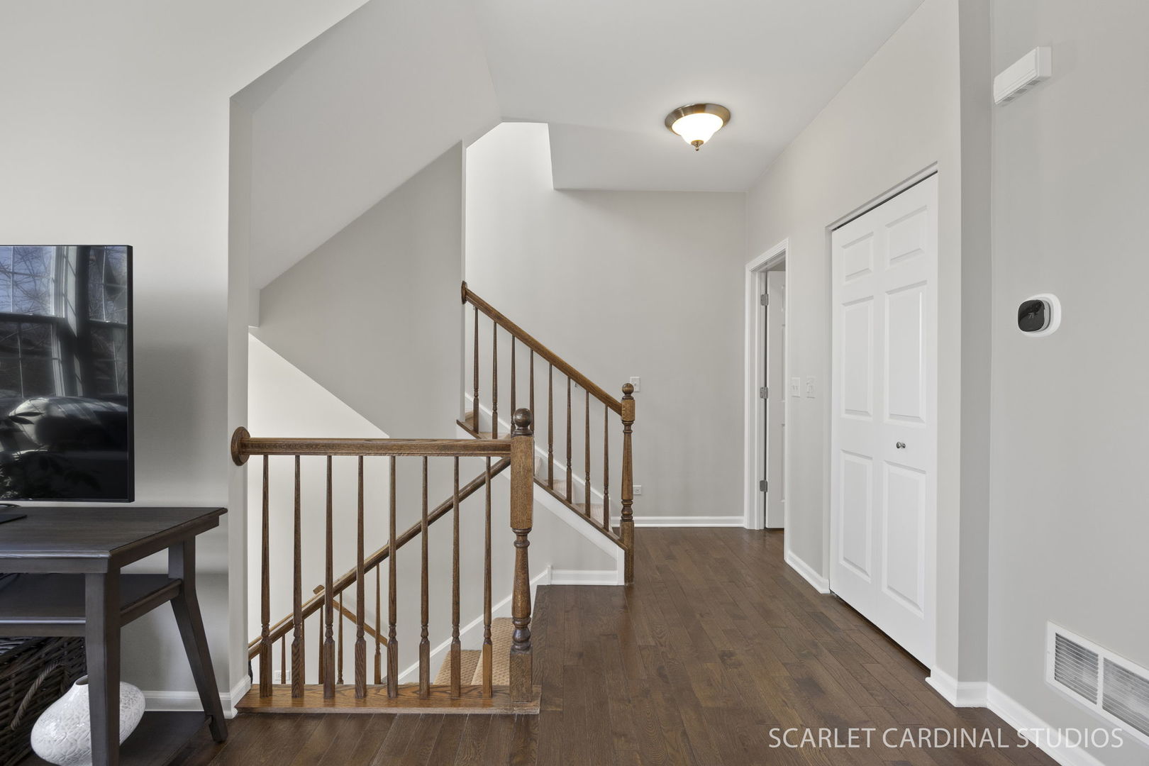 259 Bennett Drive Carol Stream, IL 60188 - Photo 18 of 31 a view of a hallway with wooden floor and entryway