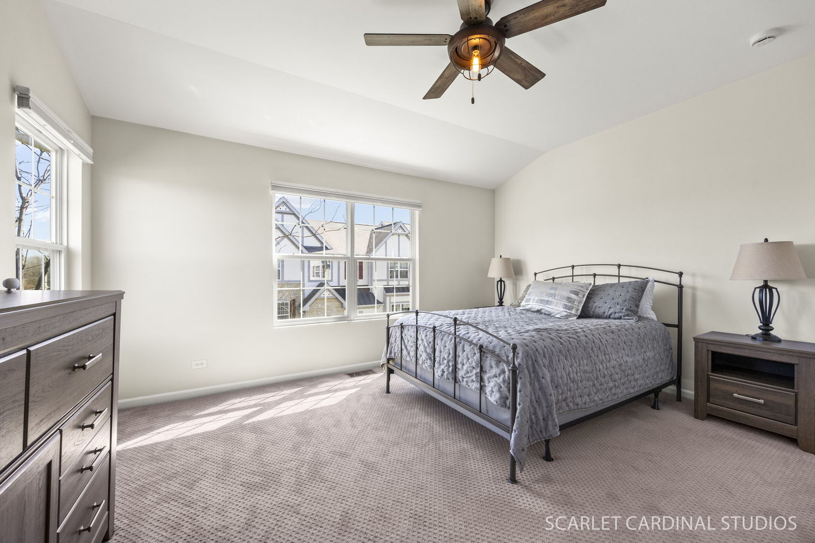 259 Bennett Drive Carol Stream, IL 60188 - Photo 22 of 31 a spacious bedroom with a bed a dresser and windows