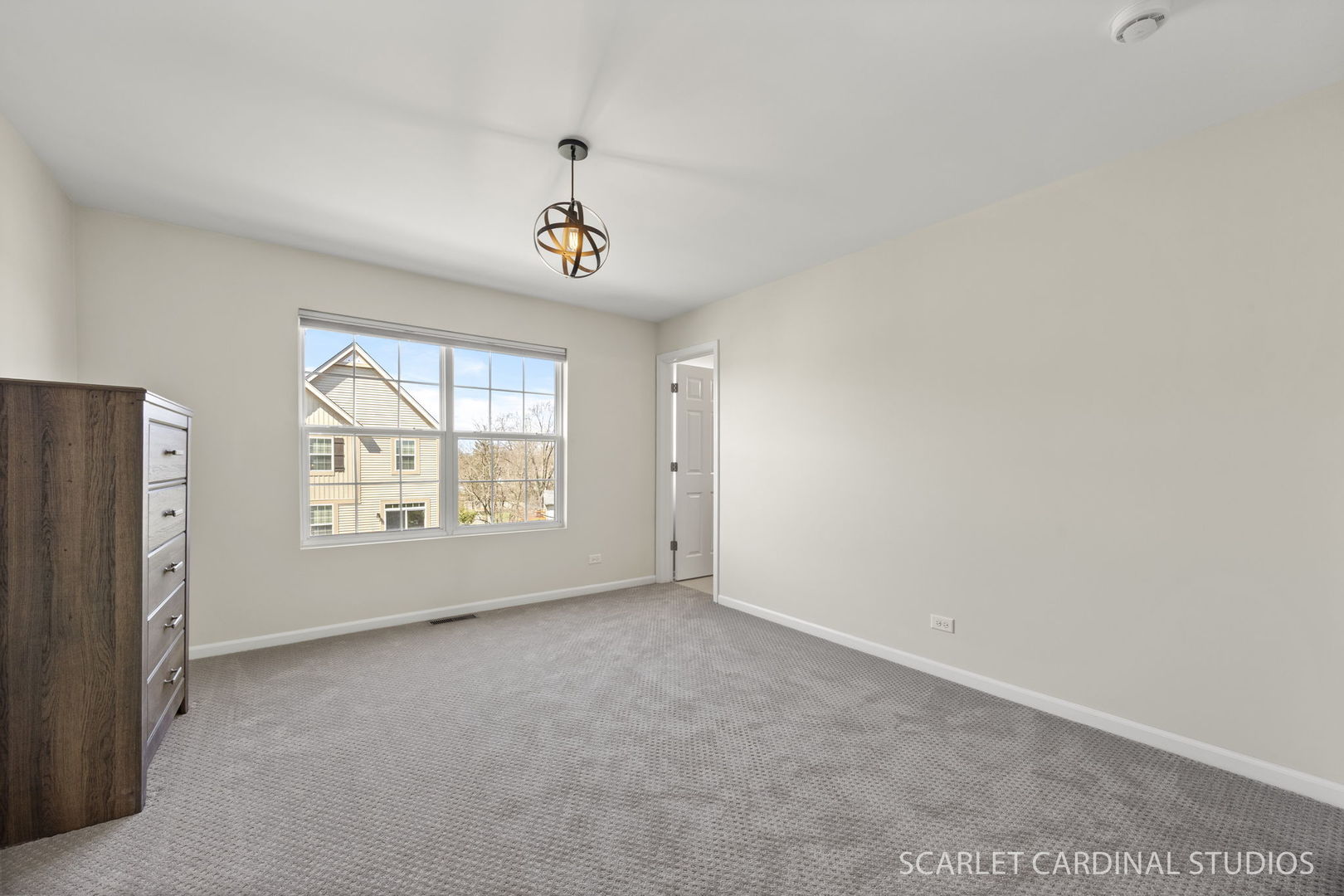 259 Bennett Drive Carol Stream, IL 60188 - Photo 26 of 31 an empty room with windows and refrigerator