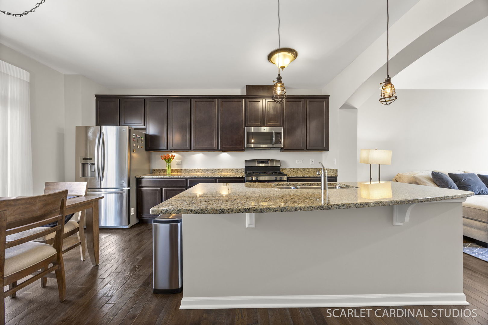 259 Bennett Drive Carol Stream, IL 60188 - Photo 7 of 31 a kitchen with stainless steel appliances granite countertop a sink a stove and refrigerator