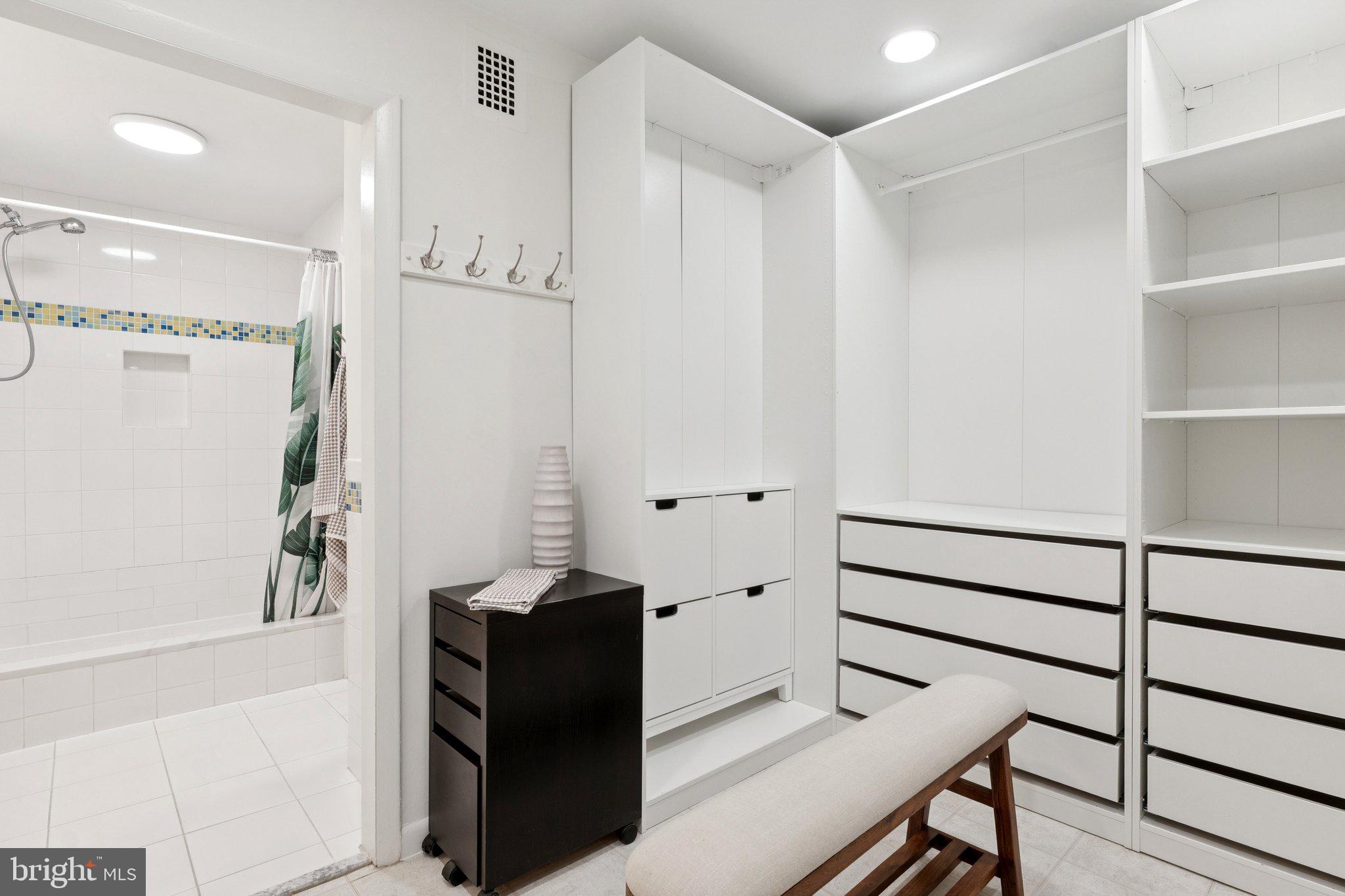 1880 Columbia Road Northwest, Unit 204 Washington, DC 20009 - Photo 15 of 23 a view of a hallway with wooden floor and windows