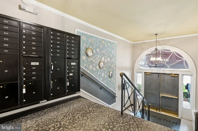 a view of a tall building next to a road