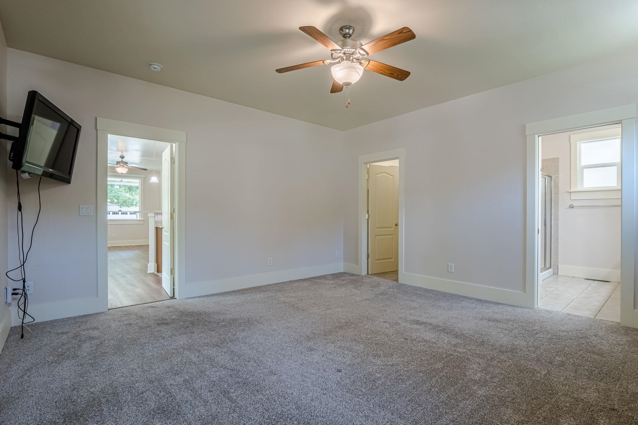812 Alyssum Court Fruita, CO 81521 - Photo 18 of 41 a view of an empty room with a window