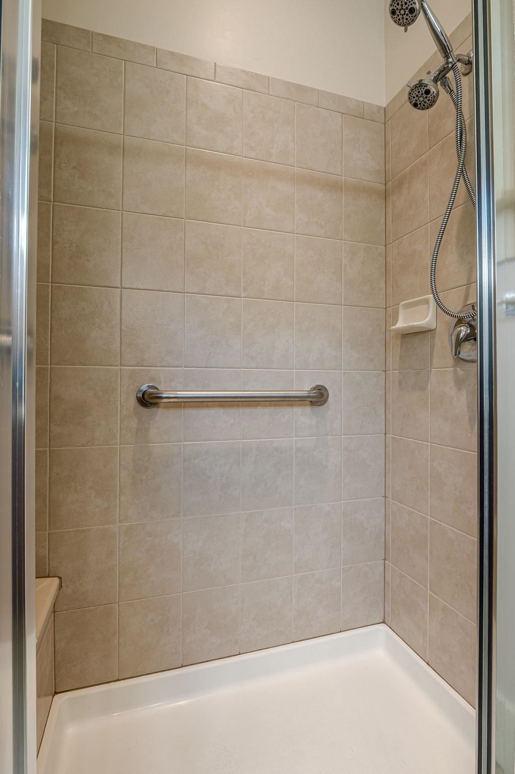 812 Alyssum Court Fruita, CO 81521 - Photo 24 of 41 a bathroom with a shower