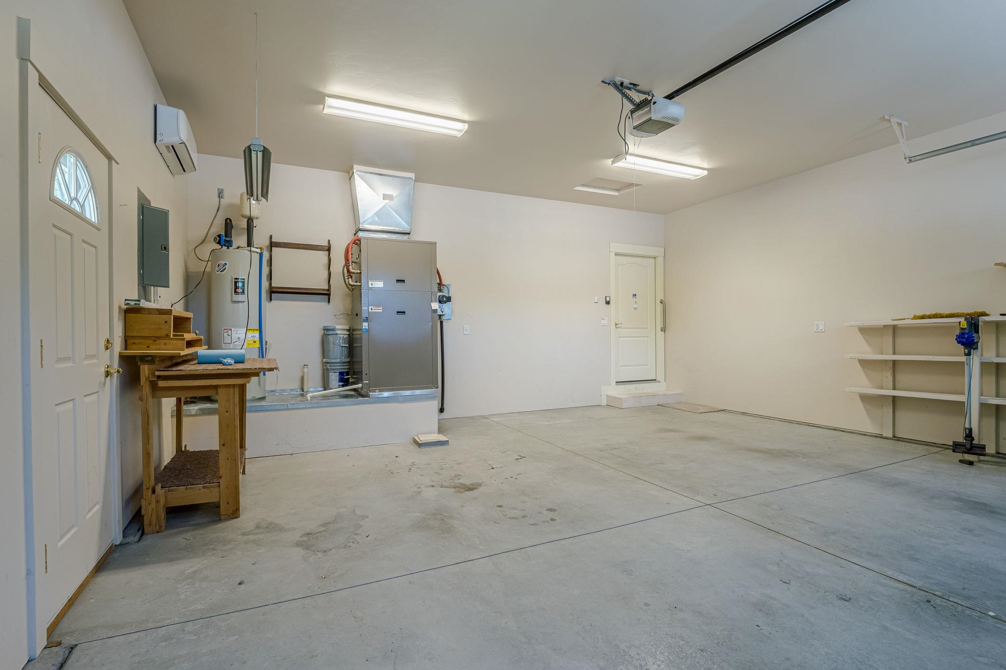 812 Alyssum Court Fruita, CO 81521 - Photo 28 of 41 a view of kitchen with furniture and a refrigerator