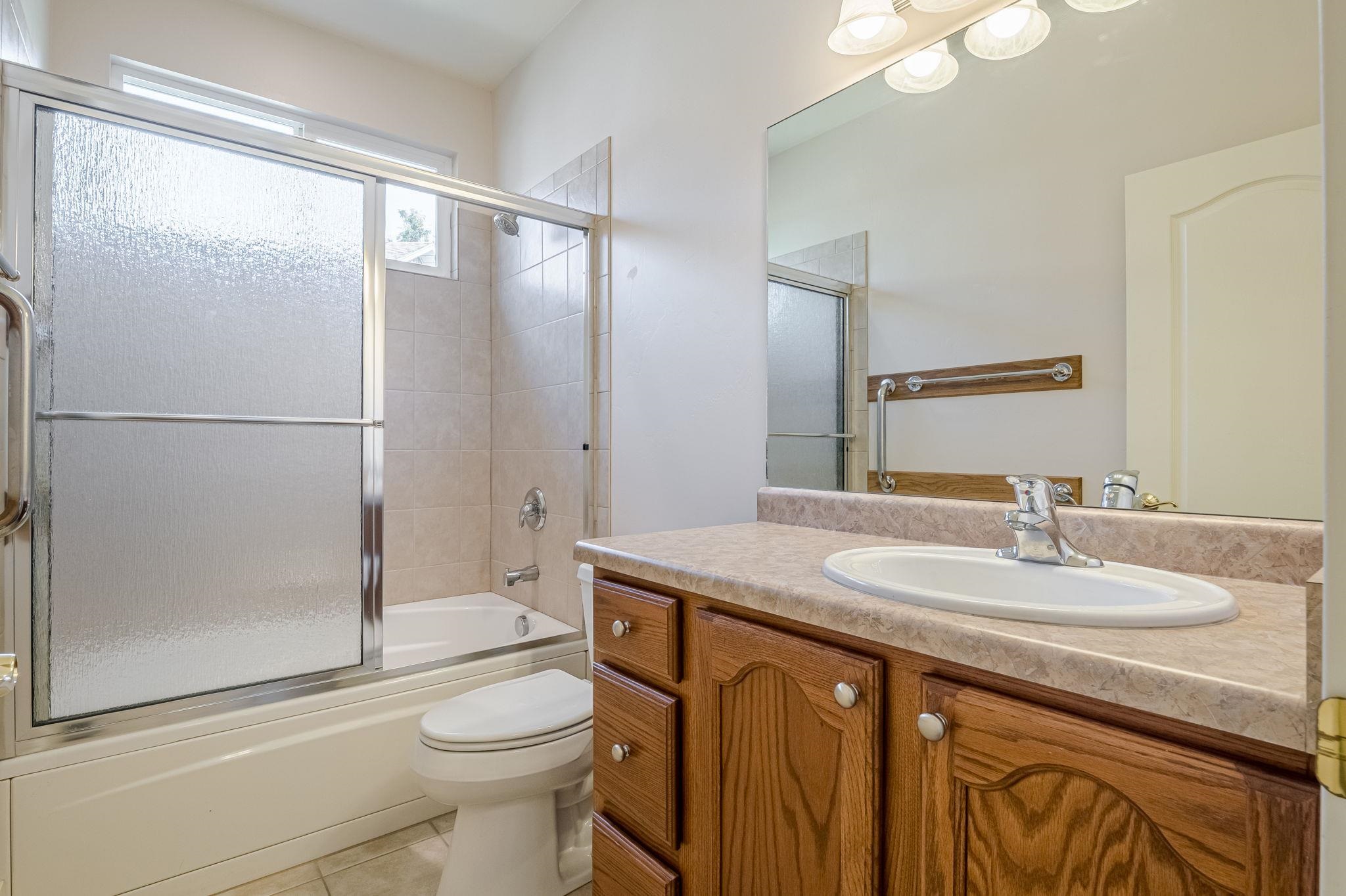 812 Alyssum Court Fruita, CO 81521 - Photo 31 of 41 a bathroom with a sink a toilet and shower