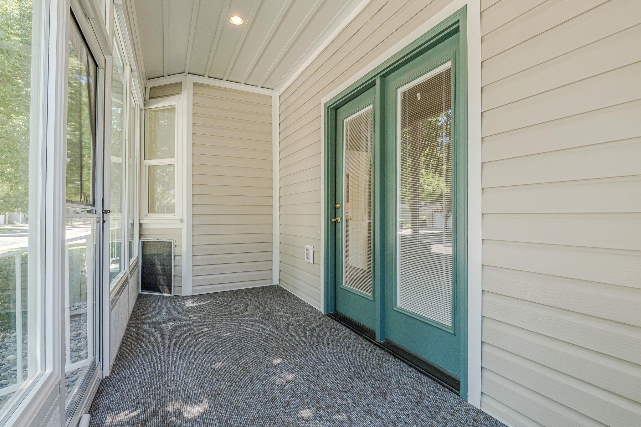 812 Alyssum Court Fruita, CO 81521 - Photo 35 of 41 a view of a porch with a door and outside view