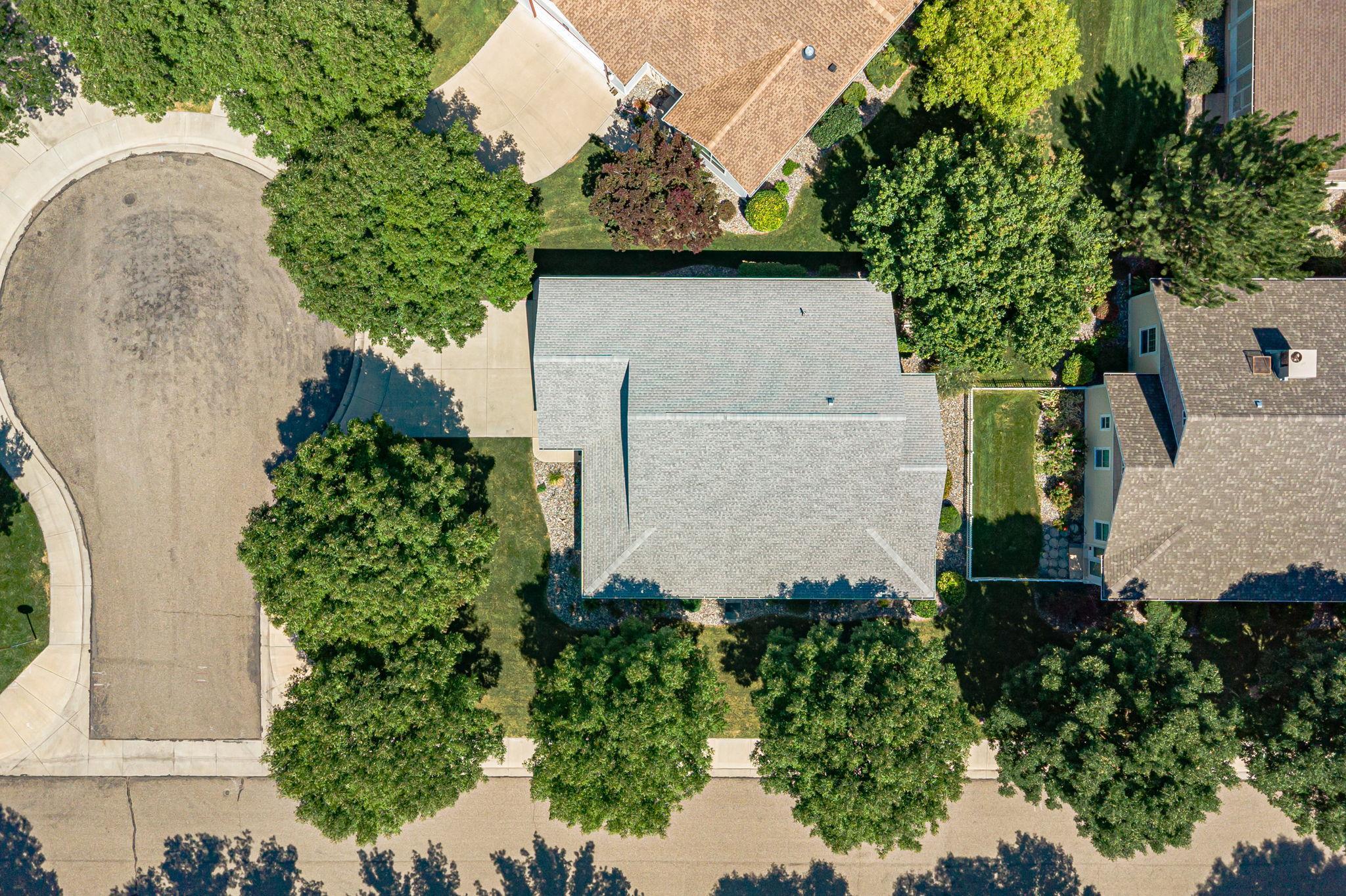 812 Alyssum Court Fruita, CO 81521 - Photo 39 of 41 an aerial view of a house with a yard and potted plants